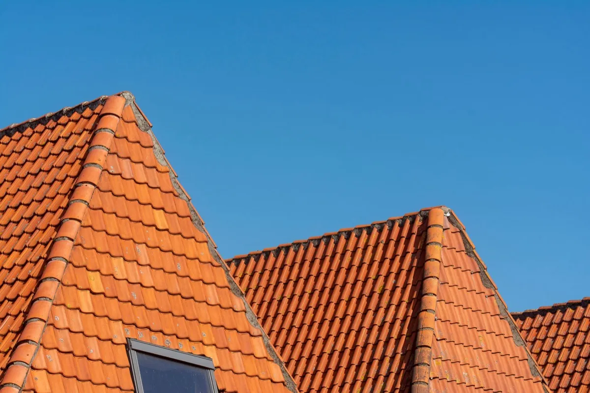 Clay barrel tile rooflines on homes in Visalia, CA